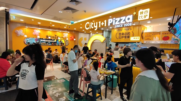 694e1f8a5775d.jpg 城市比萨社区加盟店.jpg